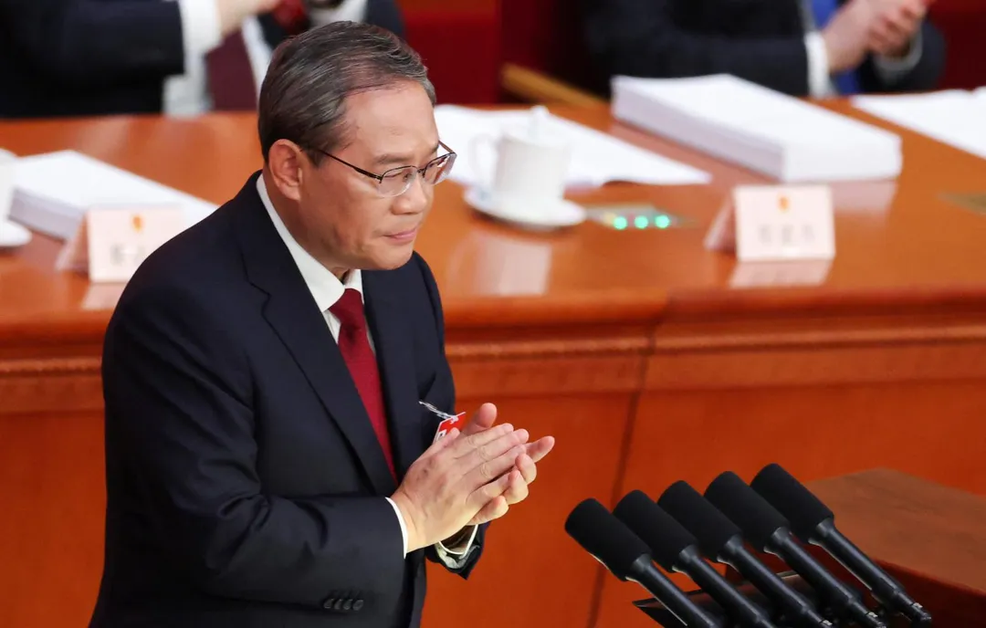 大陸國務院總理李強今在人大開幕式進行政府工作報告。（圖／路透社）