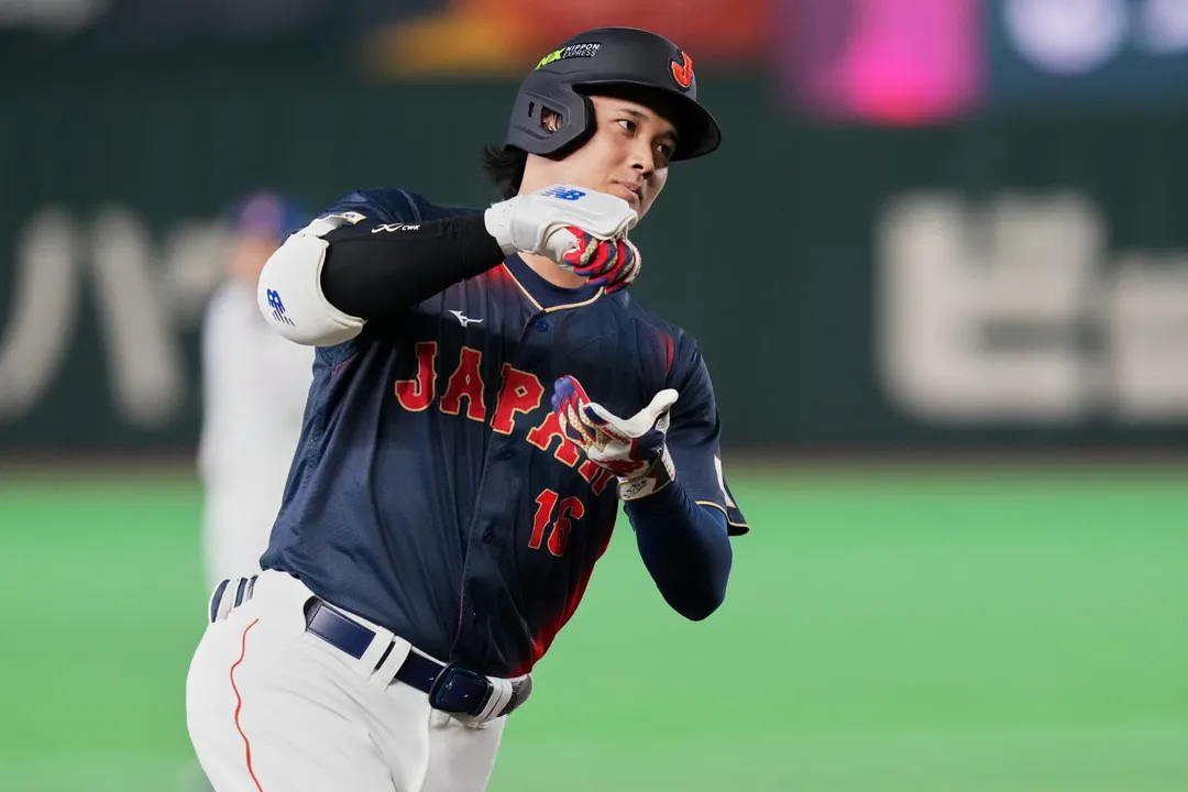 大谷翔平比出「抹茶」手勢慶功。（圖／美聯社）