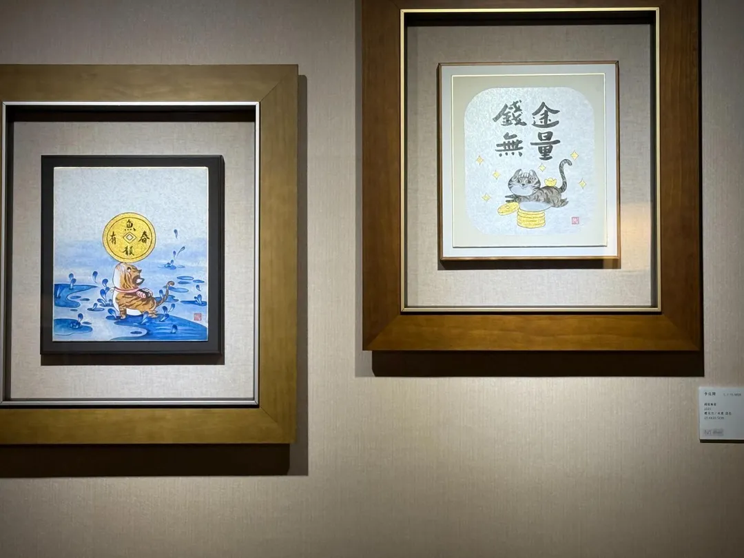 貓畫作和招財與壽司有關。（圖／黃宏輝提供）