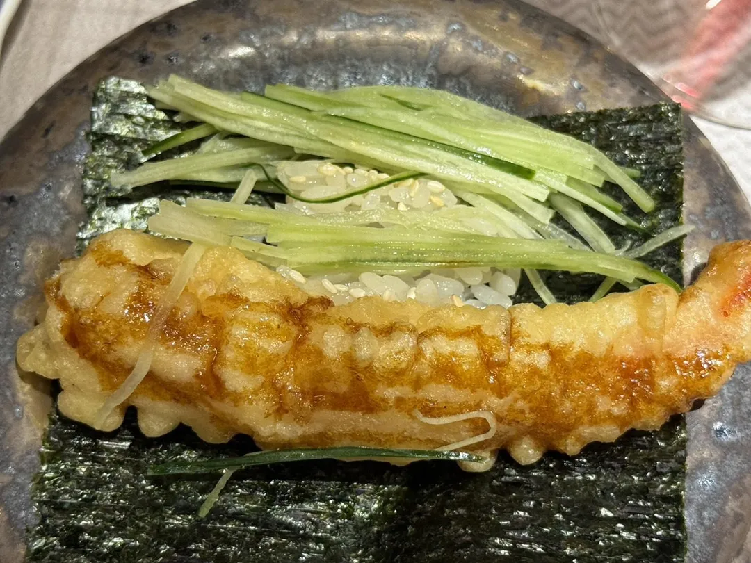 黃瓜與醃蘿蔔相佐爽口。（圖／黃宏輝提供）