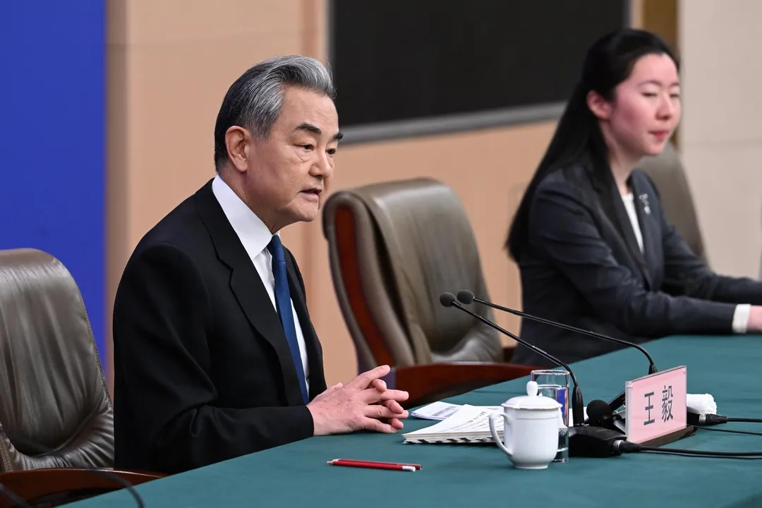 王毅在記者會上談及伊朗局勢。（圖／新華社）