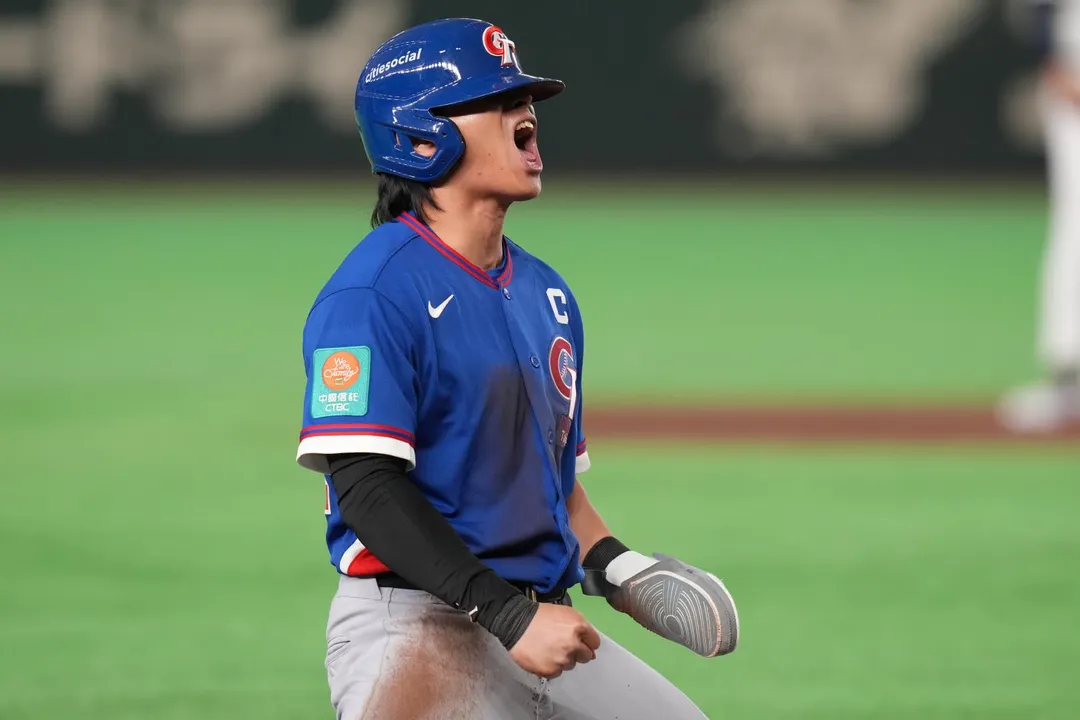 陳傑憲10局跑回致勝分。(圖/美聯社)