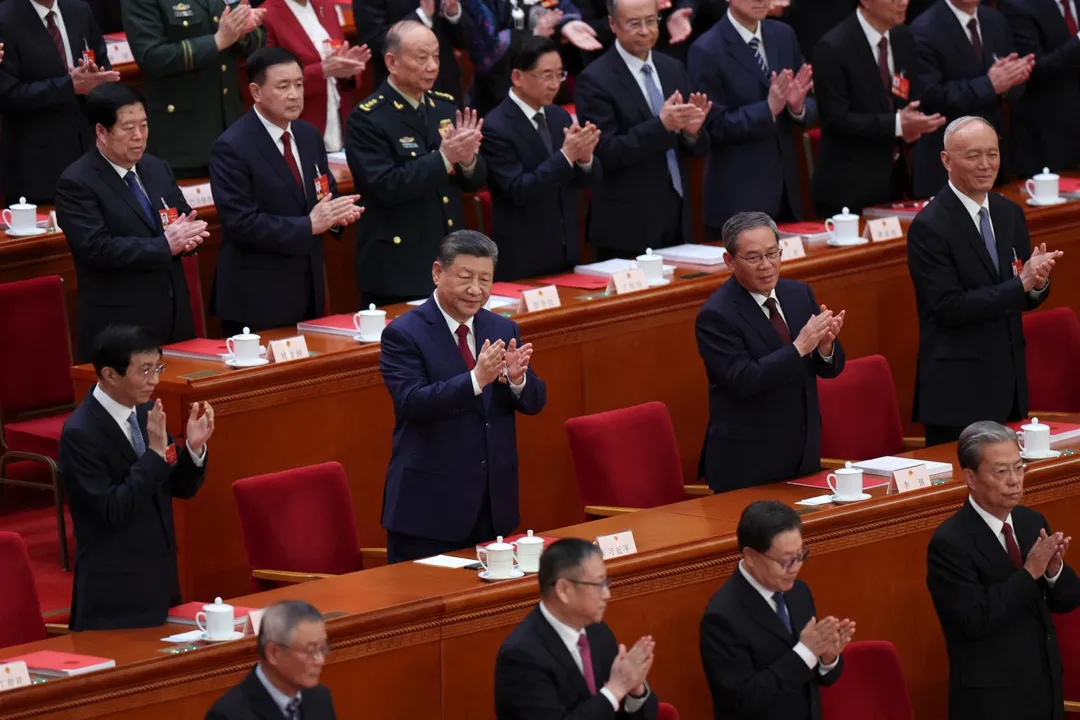 3月12日，習近平和其他國家領導人在北京人民大會堂舉行的全國人大閉幕式上。（圖／路透社）