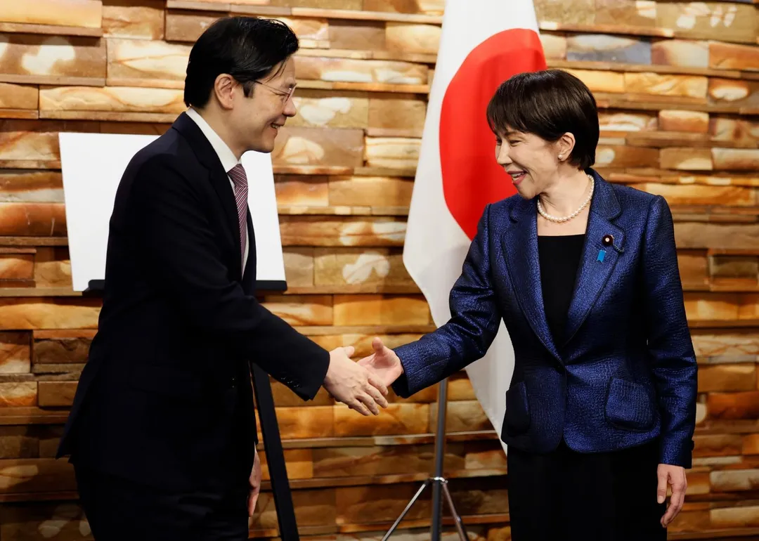3月18日,黃循財在東京與日本首相高市早苗舉行會晤。(圖/美聯社)