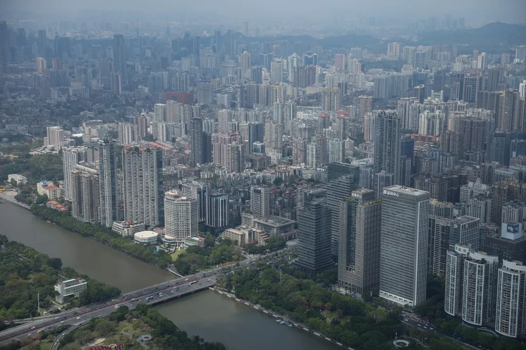 圖為廣東廣州市的商業及住宅建築。（圖／路透社）