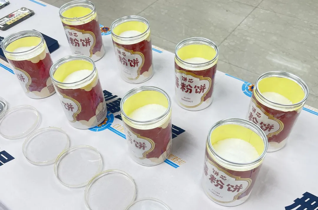 警方查獲運毒集團利用薯粉餅罐走私海洛因。（圖／翻攝畫面）