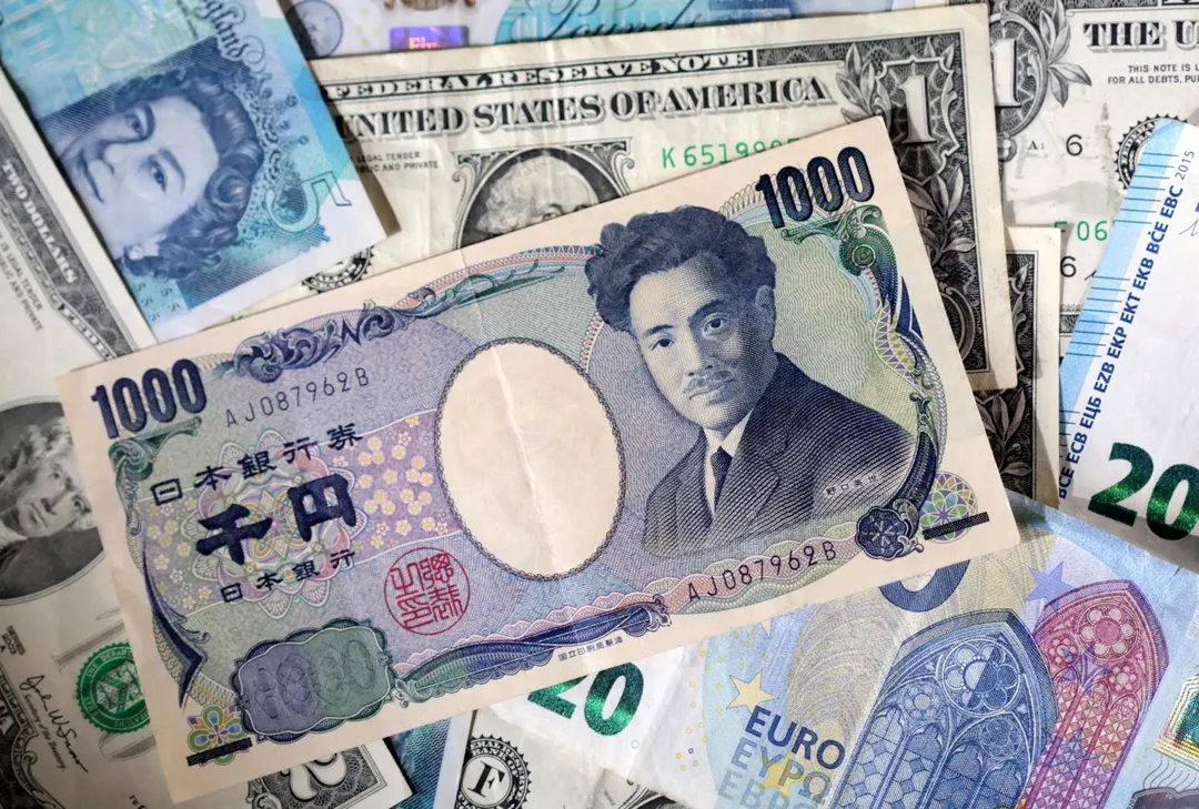 日圓、英鎊、美元。（示意圖／路透社）