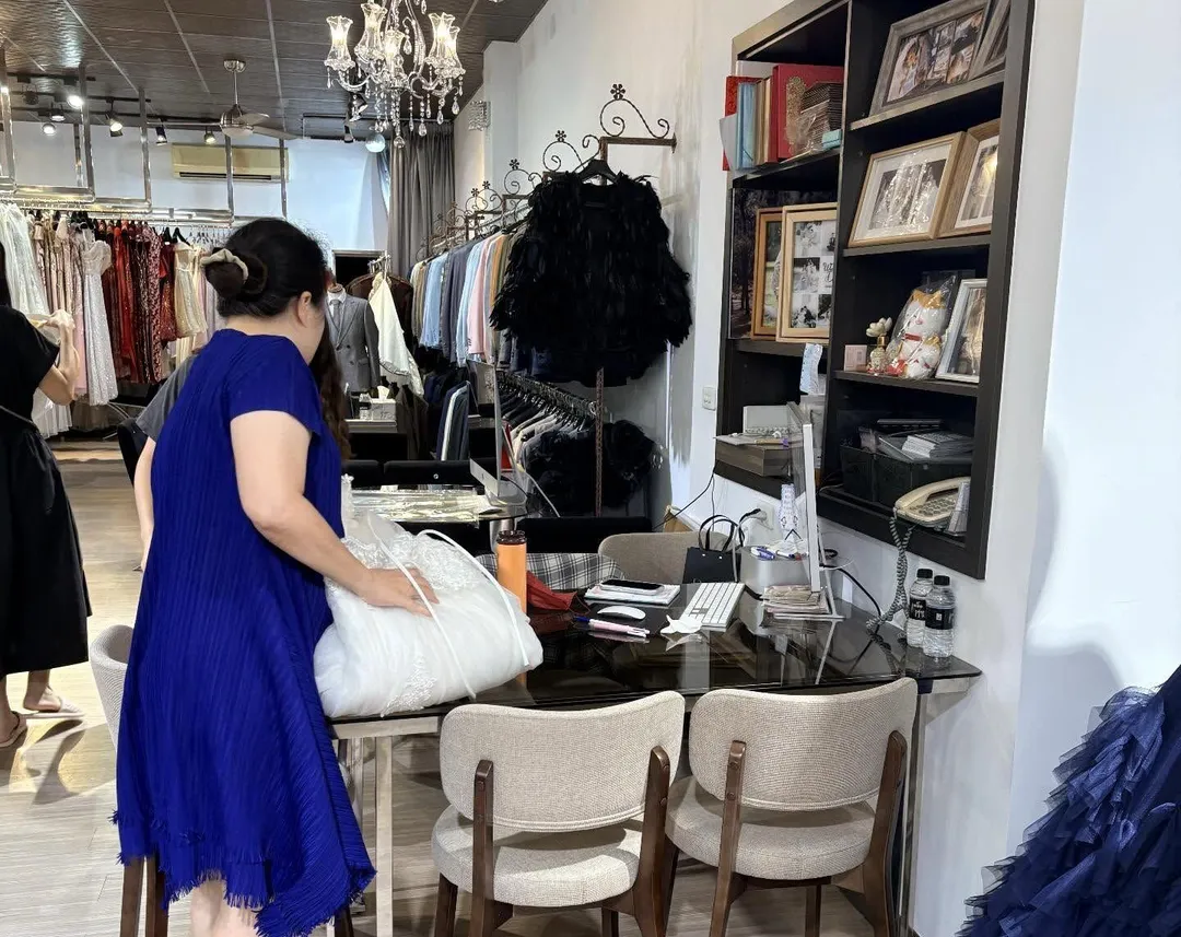 婚紗店老闆娘的義舉讓人感佩。（圖／翻攝Threads）