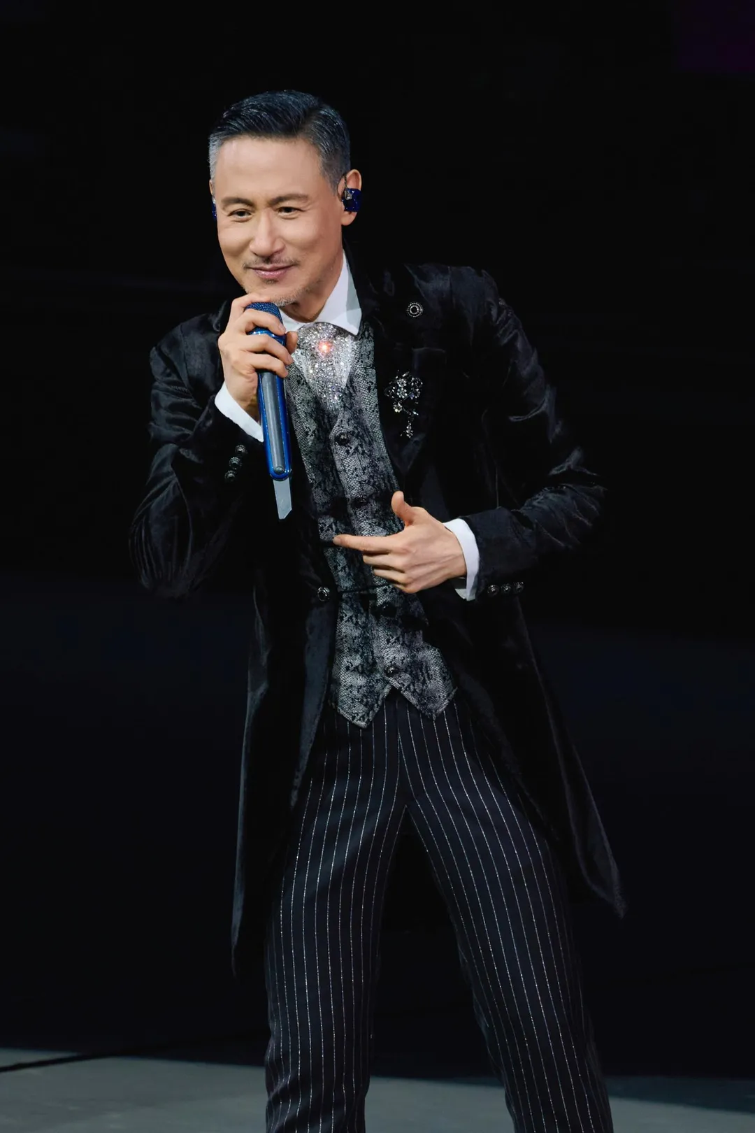 張學友曾吐槽歐漢聲:「靠我賺了不少錢吧?」。(圖/環球音樂 提供)