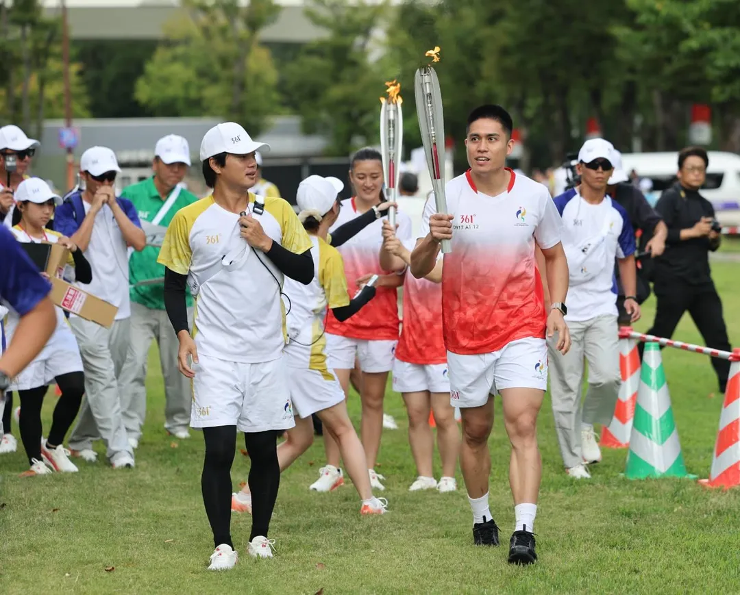 名古屋亞運聖火傳遞在名古屋久屋大通公園舉行，我國由陳盈駿代表參加。（圖／運動部提供）
