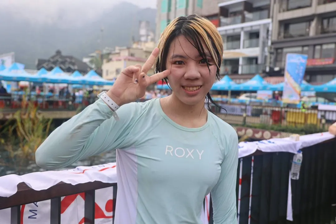 來自高雄的李子芊是本屆日月潭泳渡首位上岸女性。（圖／南投縣政府提供）