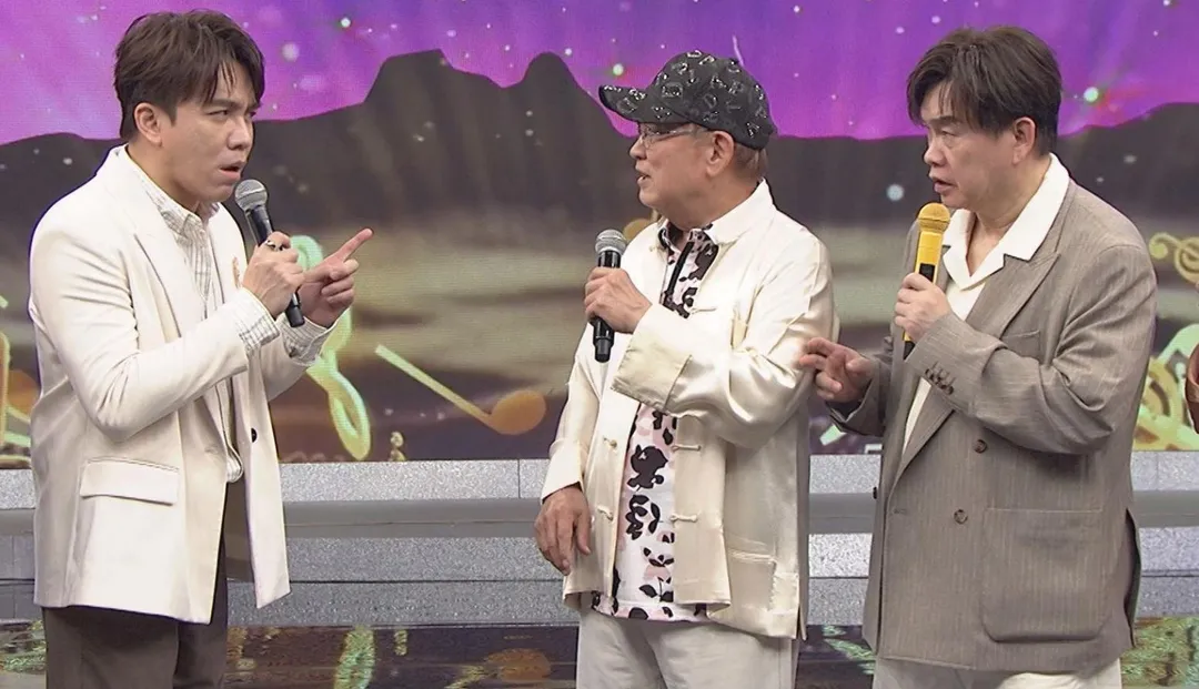 劉福助（中）表示演唱〈燒肉粽〉時不會「拉長尾音」 。（圖／中視提供）