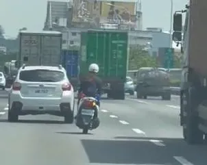 影/女警追車拼命飆上國道！穿梭車陣超驚險　國道警依法開罰