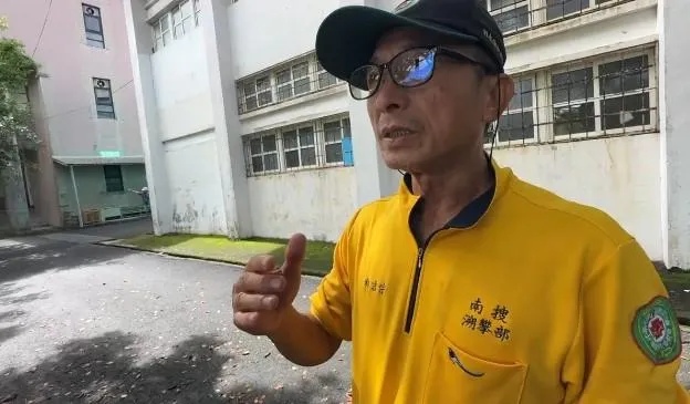 中華民國山難救助南搜顧問林吉宗談起張男哽咽。（圖／中天新聞）