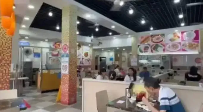 吳老闆經營的餐飲店。(圖/翻攝《南方都市報》)