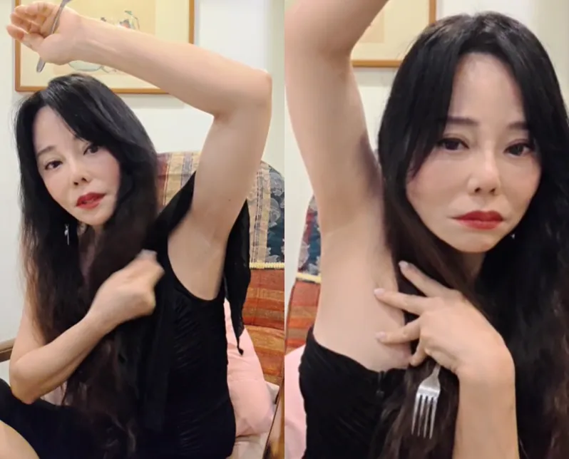 狄鶯抬手秀腋下。(圖/翻攝自狄鶯Twitch)