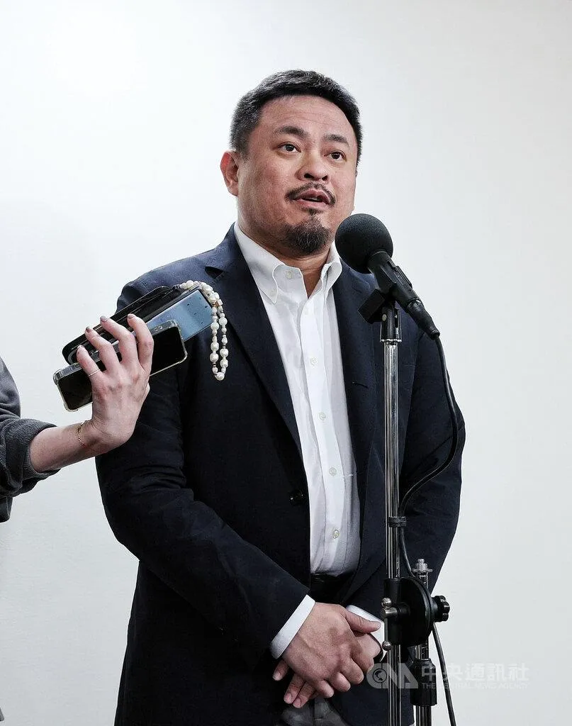 勞動部長洪申翰（圖／中央社）