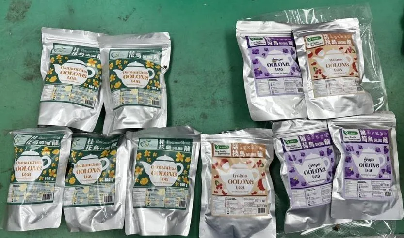 該批毒品用烏龍茶外包裝掩護。（圖／翻攝畫面）