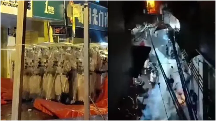 【影】群眾扔瓶、警擲催淚彈！傳廣州海珠區爆反封控抗議　激烈衝突現場疑曝光