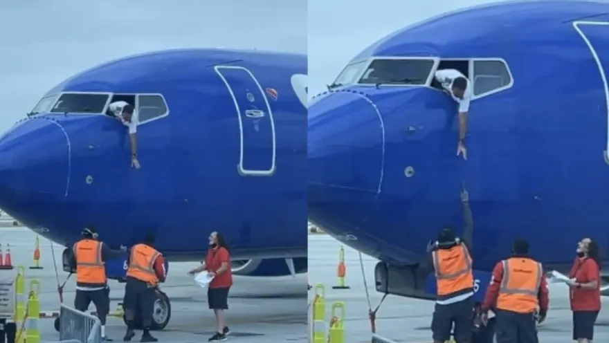 【影】英勇機長神救援！上半身探出窗外「交貨」　讓遺失手機物歸原主