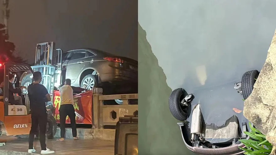 【影】94狂！車位被占對方拒移車　男子霸氣找來推高機直接把車扔河中