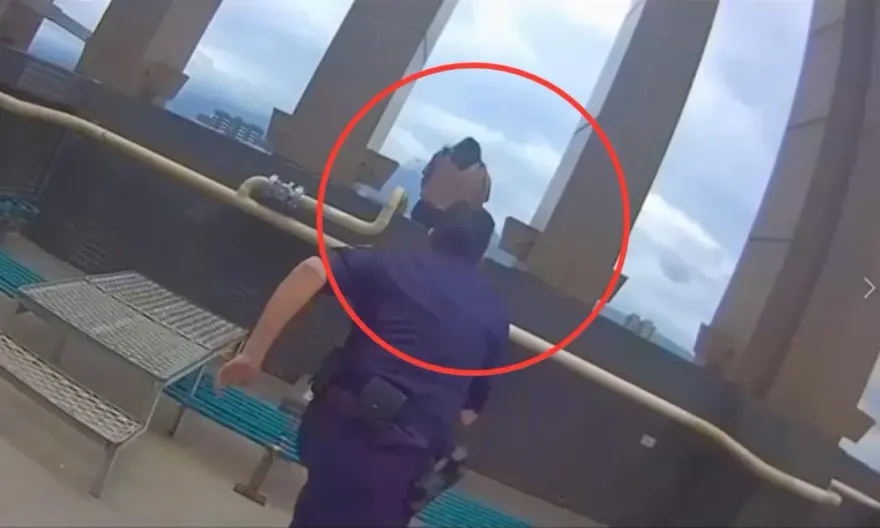 影/驚險！淡水女雙腳懸空跨坐24樓外牆　員警一個MOVE及時拉回救命