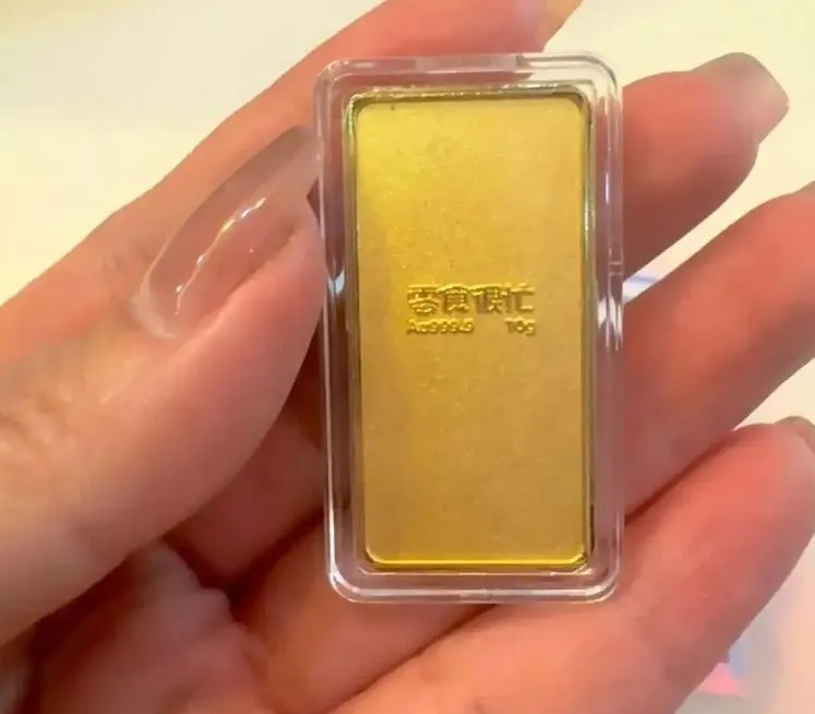 幸運！陸女「貪吃」買百餘元零食　意外抽中價值6萬10g金牌