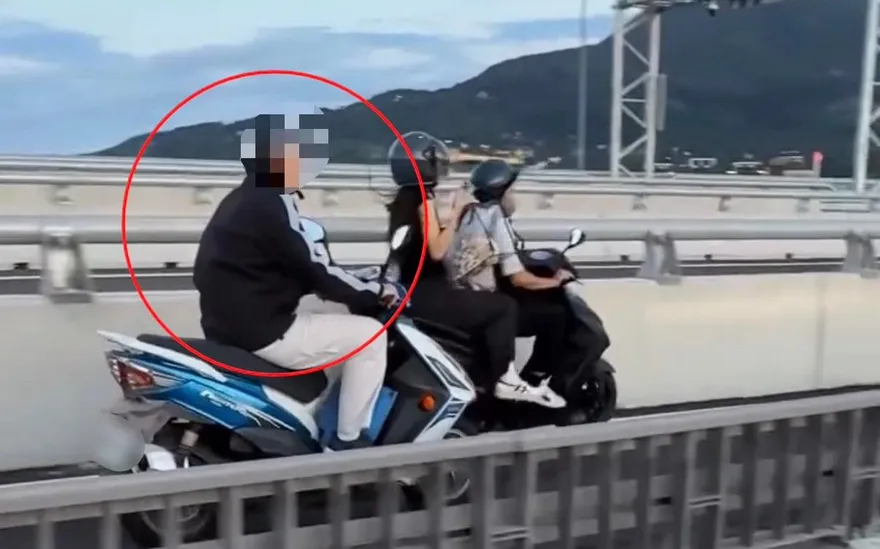淡江大橋機車騎士龜速看風景引衝突　警方依法開罰