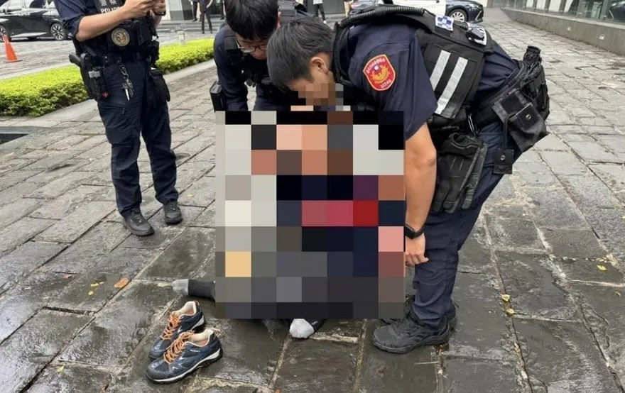 電視台門口點煙火、抱瓦斯桶與警對峙　莽男遭判刑4月