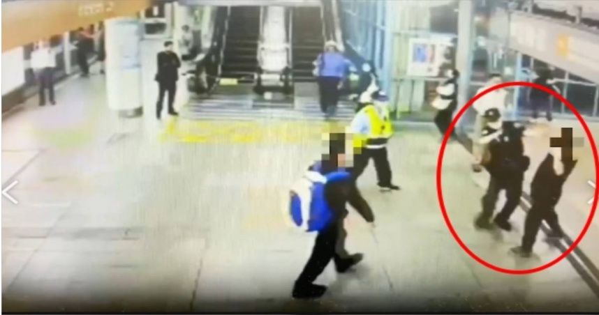 醉漢大鬧捷運站！揮拳揍警遭壓制上銬送辦
