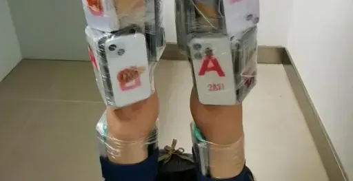 走私猖獗！陸男「身綁50台iPhone」入境　港女「改裝輪椅」藏百台手機