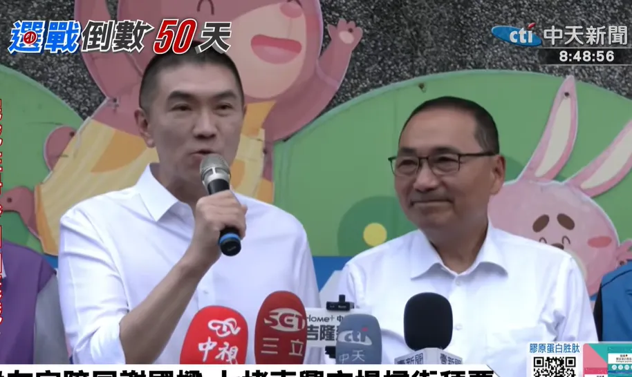 新北市長侯友宜9日赴基隆陪謝國樑掃街拜票。（圖／中天新聞）