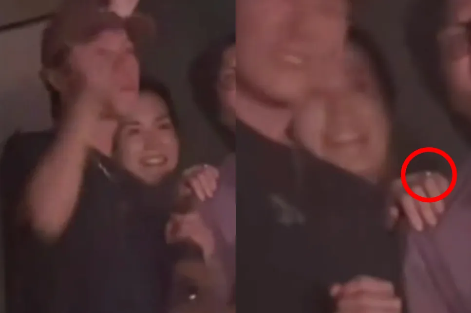 王菲30日現身北京鳥巢看謝霆鋒的演唱會，無名指疑似戴著鑽戒。（圖／翻攝自微博）