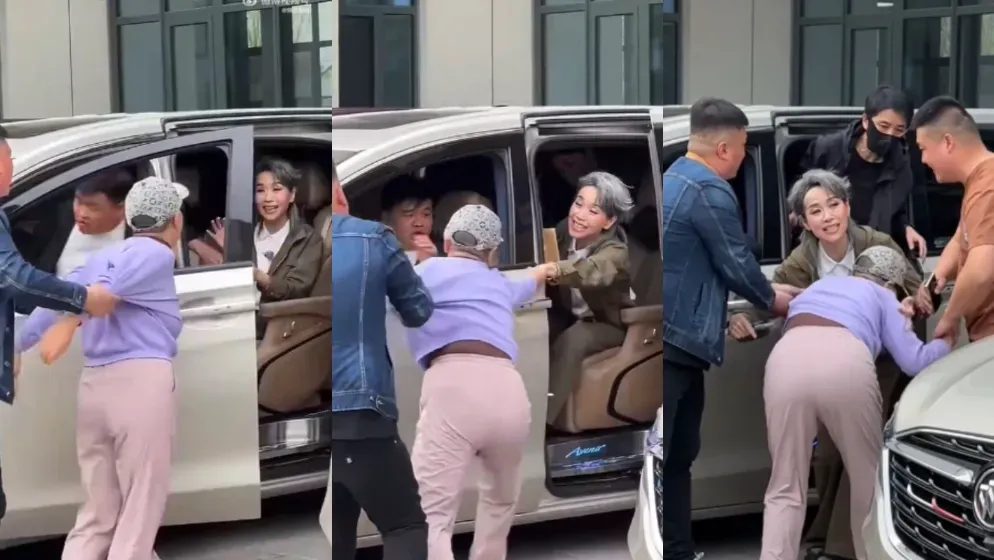 葉童被狂熱粉絲拉下車後微笑給予對方擁抱。（圖／翻攝自微博）